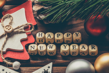 Happy New Year background, Christmas decorations on a wooden background, retro style tonedの写真素材