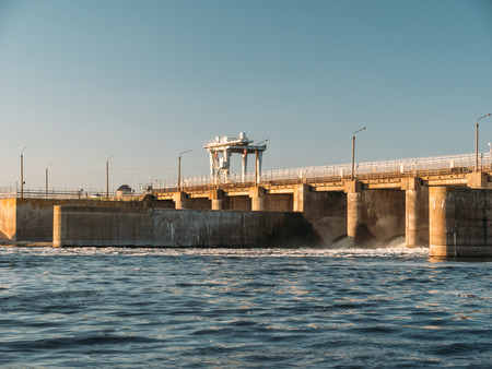 Hydro dam at water reservoir, Hydropower Plant at sunset timeの写真素材