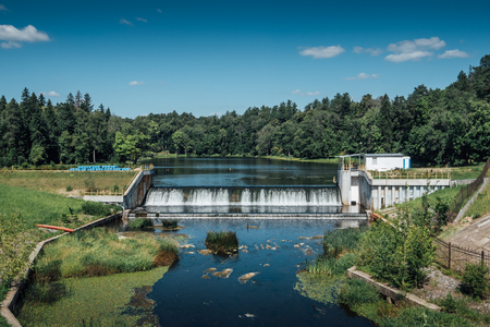 Small ancient dam on the river Inoch in the Moscow region, Russia, Hydroelectric power stationの写真素材