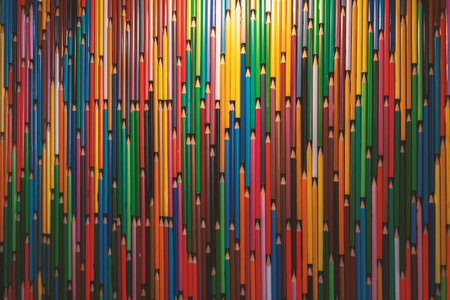 Colorful pencil wall creative background as backdrop or wallpaper for design. Many multicolored pencils pattern with copy spaceの写真素材
