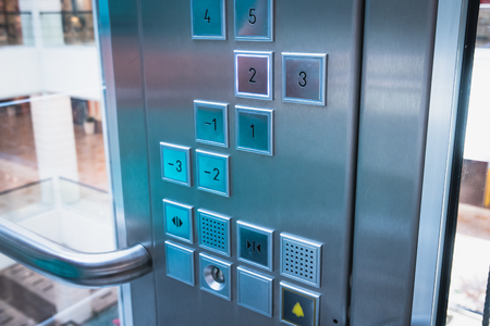 Elevator buttons control panel in modern business building or Mall or shopping center, close up,...
