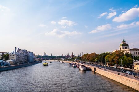 Moscow, Russia - Circa September 2018 : Panorama of Moscow river with boats and embankment and view on Kremlin on red Square.のeditorial素材