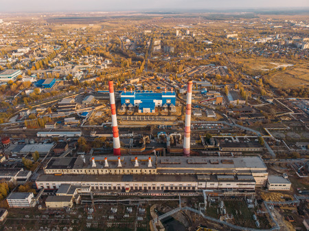 Aerial view of Voronezh Power Plant or station with high chimneys near water reservoir at sunset, drone photo.の写真素材