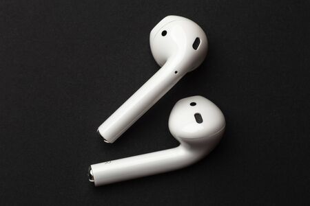 Moscow, Russia - Circa December 2018: Apple AirPods - wireless bluetooth earphones or headphones,...