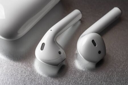 Moscow, Russia - Circa December 2018: Apple AirPods - wireless bluetooth earphones or headphones,...