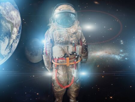 Astronaut or spaceman or cosmonaut on space background with blue and red light as sci-fi or...