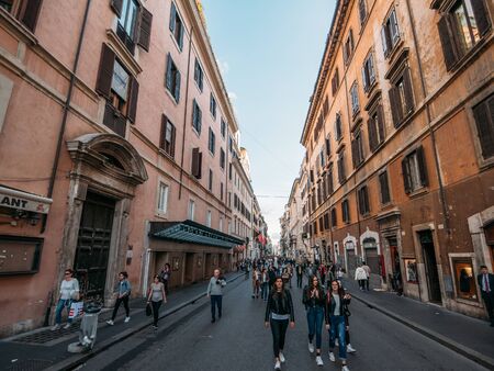 Rome, Italy - Circa October 2019: Streets of historic center of Rome with local people and tourists walking in city on narrow streets of old town.のeditorial素材