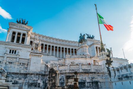 Rome, Italy - October 2019 : Altar of the Fatherland or Monumento Nazionale a Vittorio Emanuele II in Rome, Italy with Italian flag.のeditorial素材