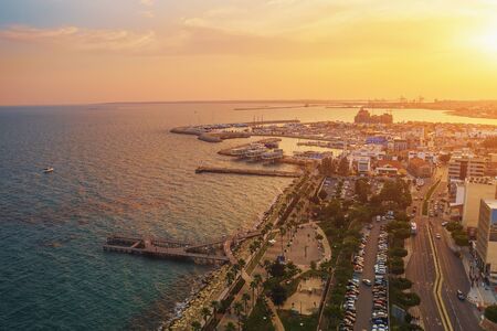 Limassol, Cyprus aerial panoramic view at sunset. Evening mediterranean resort town or city with alley, harbour and streets from above, drone photo.の写真素材