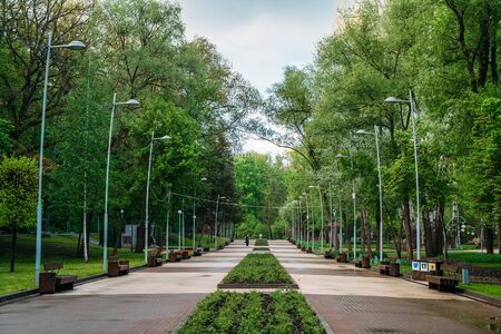 Empty spring central Voronezh park without people in coronavirus social distancing times.の写真素材