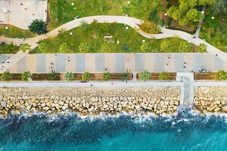 Molos Promenade park, Limassol city coast, Cyprus, aerial top view.