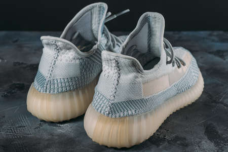 Moscow, Russia - June 2020 : Adidas Yeezy Boost 350 V2 Cloud White - Famous Limited Collection Fashion Sneakers by Kanye West and Adidas Collaboration, Trendy Sport Shoes.のeditorial素材