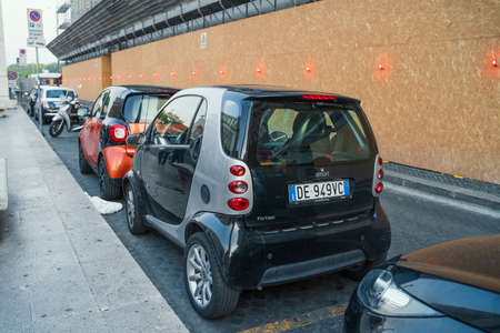 Rome, Italy - October 2019 : Many perked small electric cars in Rome street.のeditorial素材
