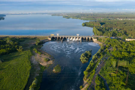 Hydroelectric dam or hydro power plant on river, aerial panoramic view.の写真素材
