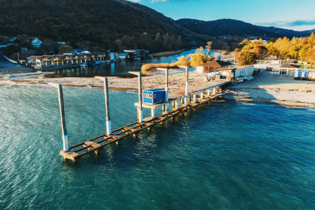 Aerial view of Arkhipo-Osipovka beach and old concrete pier, black sea coast, resort for vacations and pleasure, view from above.の写真素材