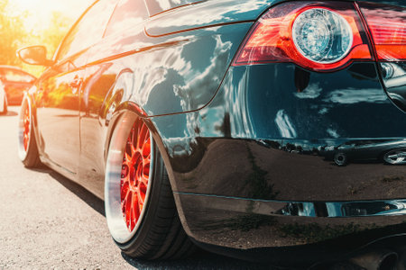 Tuned sport car with custom wheel and low profile like lowrider style.の写真素材