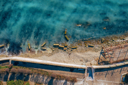 Aerial top view pf ocean coast with blue water and sea shore.の写真素材