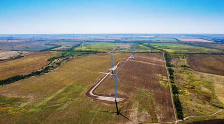 Wind turbine farm power generator aerial view. Production of renewable energy for future...