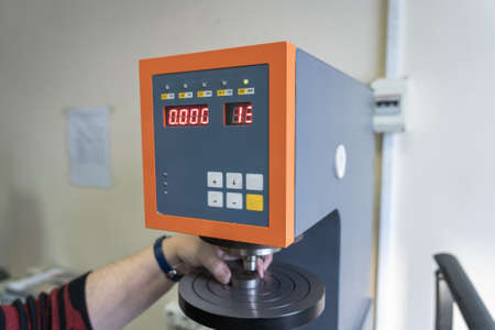 Lab machine equipment for steel tensile and bending strength test in metallurgical factory.の写真素材