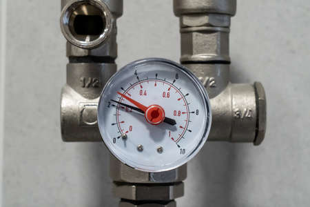 Manometer close up in heating system in boiler room.の写真素材
