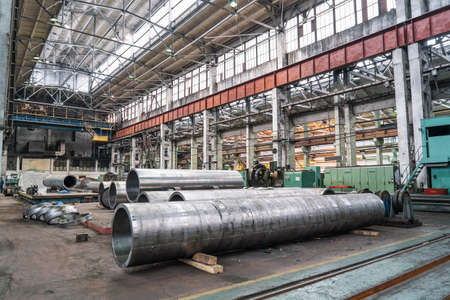 Steel pipes for processing in metal production workshop, metallurgical plant, heavy industry metalwork.の写真素材
