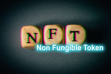 NFT non fungible token - text with glitch effect. Modern business crypto art and digital currency...