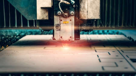CNC cutting metal. Laser plasma cutter machine close up.の写真素材