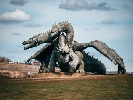 Lipetsk region, Zadonsk, Russia 2022 : 3 headed fire breathing dragon big sculpture in park for family rest and vacation. Serpent Gorynych from on Kudykina mountain.のeditorial素材