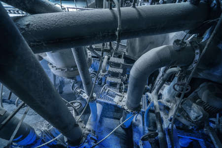 Steel pipes and tubes in waste paper recycling factory. Paper Mill.