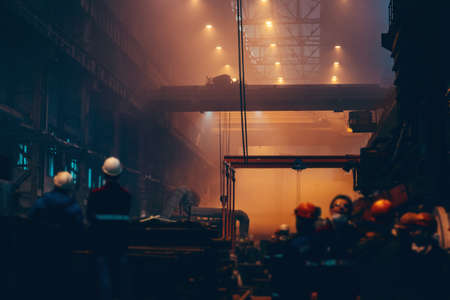 Metallurgical plant large hall inside. Industrial steel production factory. Interior of...