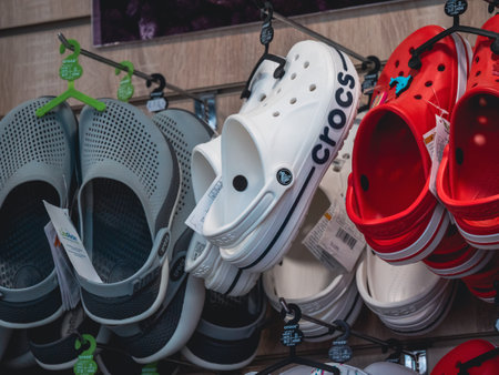Moscow, Russia - May 2022 : Crocs clogs in shop for sale. Comfortable footwear. Crocs Inc. is American company based in Niwot, Colorado that distributes and manufactures footwear.のeditorial素材