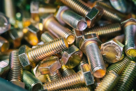 Metal screw bolts top view as industrial equipment background.の写真素材