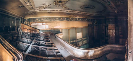 Large creepy dark old vintage hall of abandoned cinema or theatre house inside interior.の写真素材