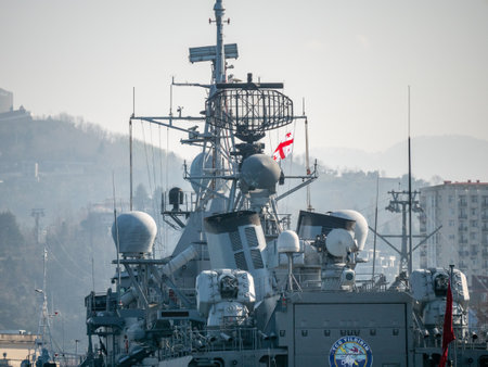 Detailed view of Georgian Flag on Turkish Navy warship superstructure featuring radar equipment and antennas - Batumi, Georgia - 05 March 2024.のeditorial素材