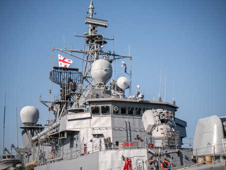 Detailed view of Georgian Flag on Turkish Navy warship superstructure featuring radar equipment and antennas - Batumi, Georgia - 05 March 2024.のeditorial素材