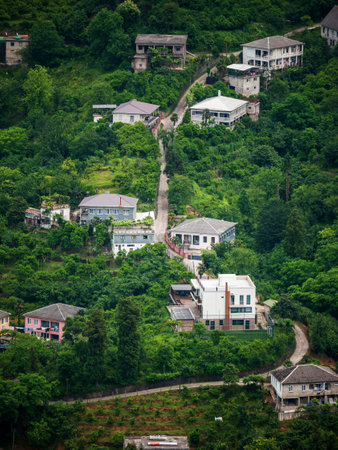 Hillside Village with Lush Greenery.の写真素材