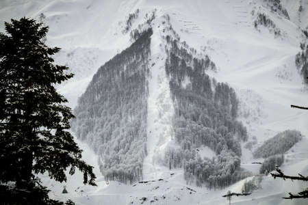 mountain peaks with snowy slopes ski resort