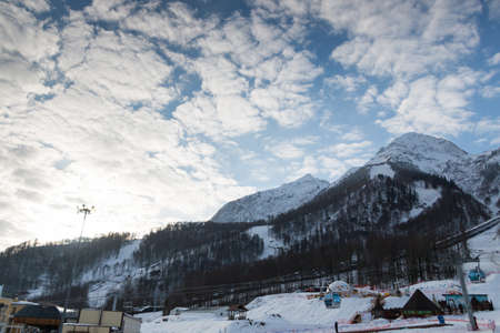 mountain peaks with snowy slopes ski resortの写真素材