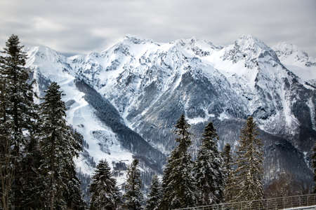 mountain peaks with snowy slopes ski resortの写真素材