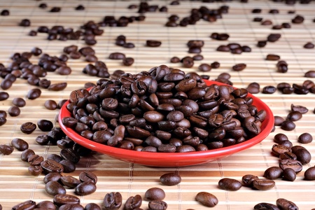 Little red saucer full of roasted beansの写真素材