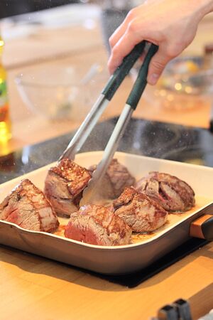 Steak slices roasted on giddleの写真素材