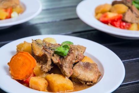 ragout made from meat and vegetables on the plateの写真素材