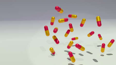 3d floating capsules medical health background. Red and golden pillsの写真素材