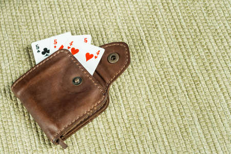 Purse made of leather and playing cards in high resolutionの写真素材