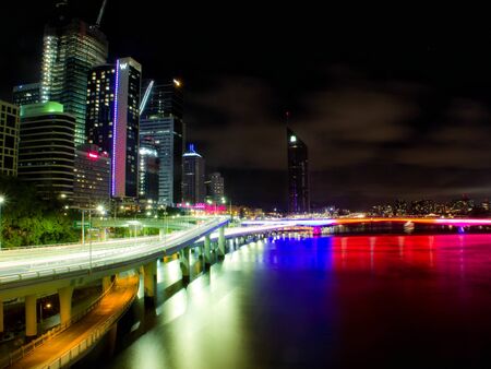 Brisbane cityscape by night on the Brisbane river.