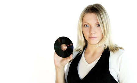 Young businesswoman with cd in front of the white background