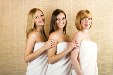 young beautiful women with towelsの写真素材