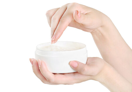 Isolated beautiful woman hands with body lotion