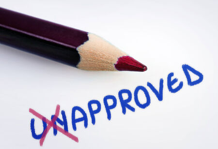 Unapproved word on grey backgroundの写真素材