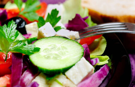 Plate with salad on tableの写真素材